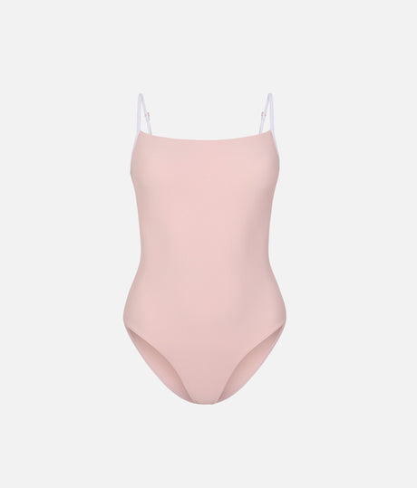 Front of Mara Dancewear Cala Ballet Pink camisole leotard, showing fine ribbing, white straps and a softly curved neckline.