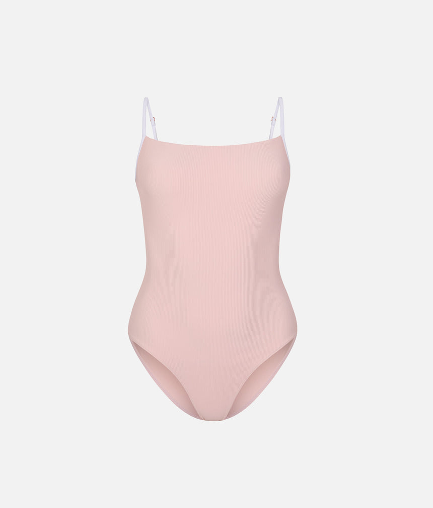 Front of Mara Dancewear Cala Ballet Pink camisole leotard, showing fine ribbing, white straps and a softly curved neckline.