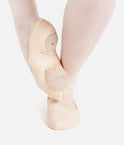 Capezio Hanami Canvas Split-Sole Ballet Shoe shown in in sur le cou-de-pied devant position.