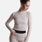 Capezio Coppola CK11012W long sleeve top in Pink, showing its fitted ribbed front and mock neck, styled with matching Anderson shorts.