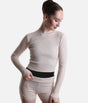 Capezio Coppola CK11012W long sleeve top in Pink, showing its fitted ribbed front and mock neck, styled with matching Anderson shorts.