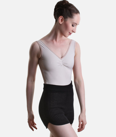 Capezio Anderson CK11014W warm-up shorts in Black, showing the short leg, ribbed waist and open knit over a pale leotard.