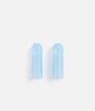 Two pale blue Tendu Cool Toe Caps standing side by side, showing their slim shape and perforated sides.