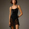 Front view of the black Bodile Gisella mesh rehearsal skirt, showing sheer fabric and gathered side detailing.