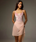 Bodile Gisella rehearsal skirt in soft pink, showing its gathered hip detail and flowing mesh hem.