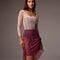 Bodile Gisella rehearsal skirt in berry pink, with ribbon side ruching and a sheer high-low hem.