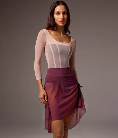 Bodile Gisella rehearsal skirt in berry pink, with ribbon side ruching and a sheer high-low hem.