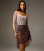 Bodile Gisella rehearsal skirt in smoky plum, showing ribbon ruching and a sheer asymmetric hem.