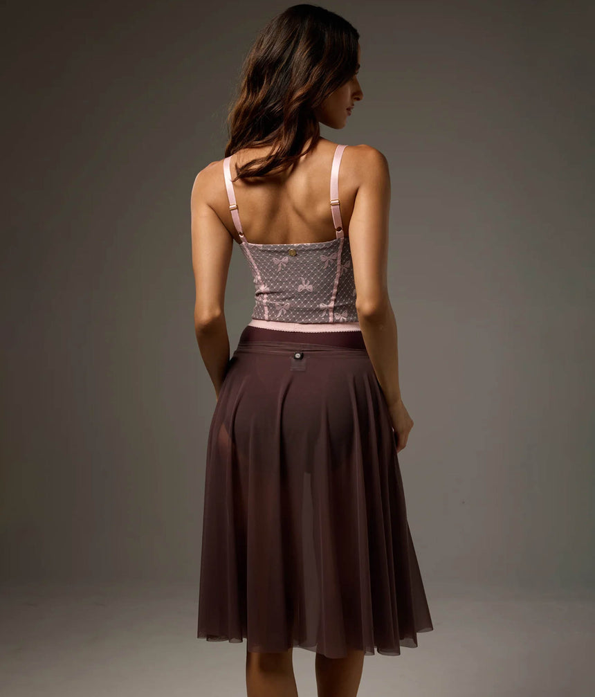 Back view of the Bodile Julieta rehearsal skirt in smoky plum, showing the sheer mesh and flowing hem.