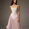 Bodile Julieta mesh rehearsal skirt in pale pink, showing its flowing full-circle shape over a white leotard.