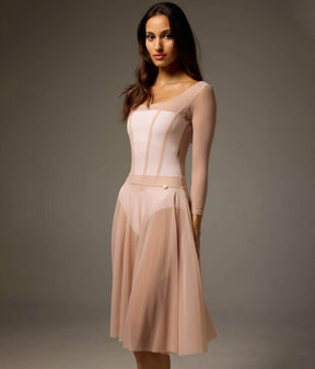 Three-quarter front view of the Bodile Julieta skirt in blush beige, showing its flowing mesh drape.