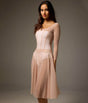 Three-quarter front view of the Bodile Julieta skirt in blush beige, showing its flowing mesh drape.