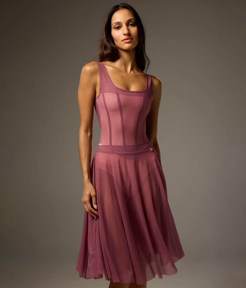 Front view of the Bodile Julieta rehearsal skirt in deep rose, with sheer mesh folds and a smooth waistband.