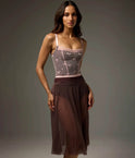 Front view of the Bodile Julieta rehearsal skirt in smoky plum, showing the sheer mesh and flowing hem.