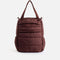 So Danca LS72 Luciana Sagioro quilted dance bag in brown, showing front zip pockets, side pockets and carry handles.