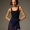 Dancer wearing a Prussian Blue Bodile Mika mesh ballet skirt with gathered ruching and a left-side split over a leotard.