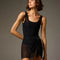 Dancer wearing a Ash Bodile Mika mesh ballet skirt with gathered ruching and a left-side split over a leotard.