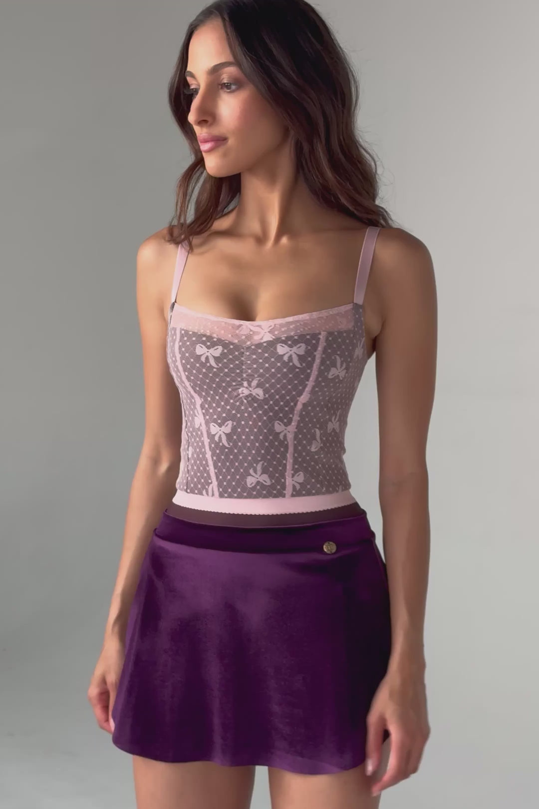 Video of  of the Bodile Zara velvet ballet skirt in deep purple, with a smooth waistband and curved hem.