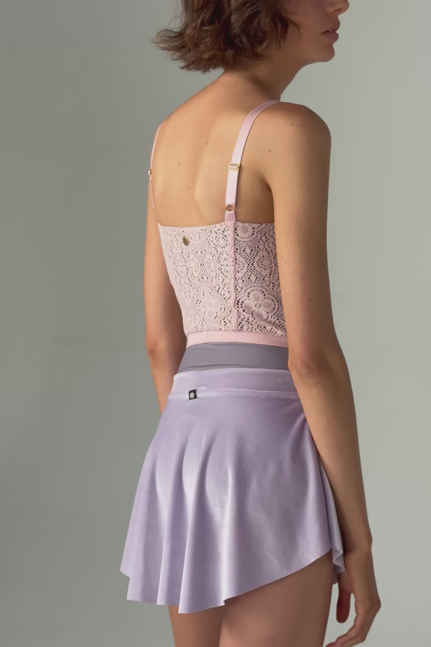 Video of Bodile Zara velvet ballet skirt in pale lilac, shown from the back and side with a curved hem.