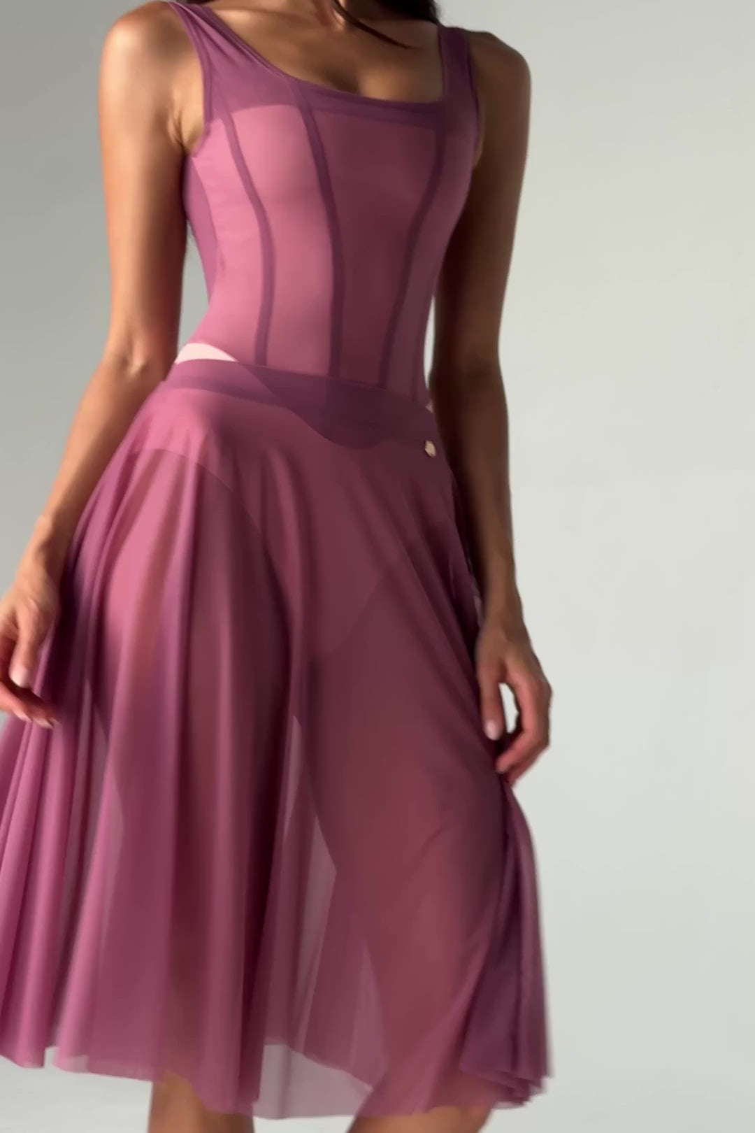 Video of the Bodile Julieta rehearsal skirt in deep rose, with sheer mesh folds and a smooth waistband.
