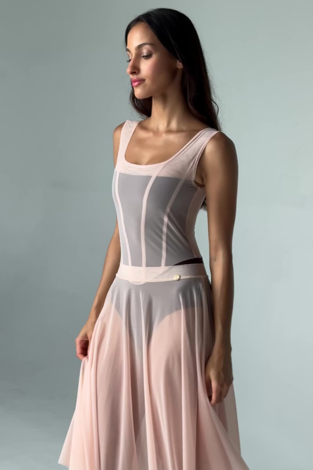 Video of the Bodile Julieta mesh rehearsal skirt in blush beige, styled over a tank leotard.