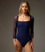 Front of Bodile Saskia Prussian Blue ballet leotard, showing its square neckline, smooth navy body and sheer three-quarter sleeves.