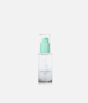 The Smooth Company Smooth Talker Hair Oil 40ml in a clear bottle with a mint-green pump and transparent cap.