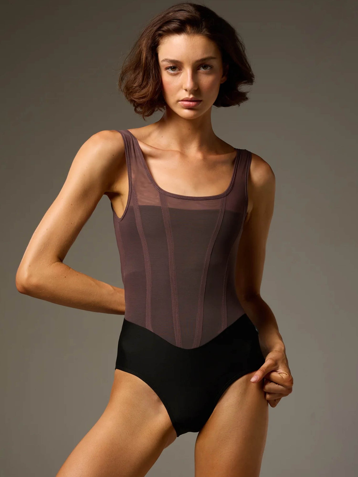 Front of Bodile Sofia Twilight Obsidian tank ballet leotard with a black lower body, smoky plum mesh and corset-style panel lines.