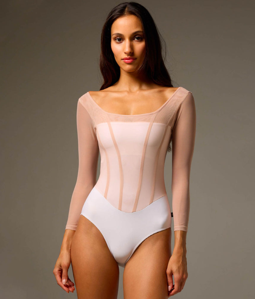 Front of Bodile Sofia Frost Nougat long sleeve ballet leotard with a white body, soft pink mesh overlay and corset-style seams.