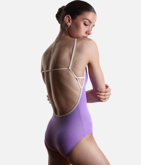 Back view of YUMIKO Tamara in Iris, showing the deep curved opening and horizontal Misty Rose strap.