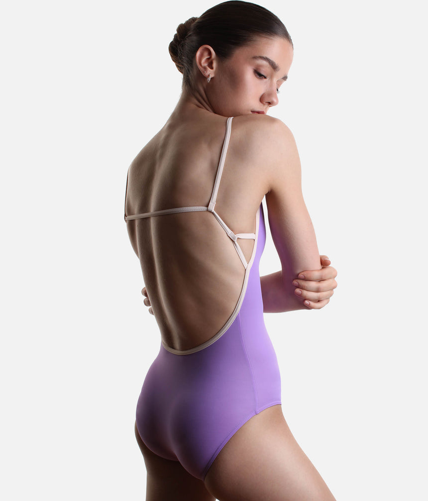 Back view of YUMIKO Tamara in Iris, showing the deep curved opening and horizontal Misty Rose strap.