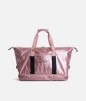 Pink Tendu Yoga Mat Bag T1097, front view showing the metallic finish, logo pocket and zipped base compartment.