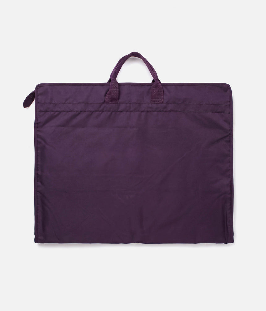 Plain aubergine reverse of the folded Tendu T1027 garment bag, showing its carry handles.
