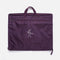 Tendu T1027 garment bag in aubergine, folded for carrying with twin handles, a front zip pocket and ballerina logo.