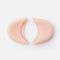Two Tendu Soft Gel Toe Pads with their openings facing each other and the perforated surfaces visible.