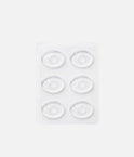 Six clear Tendu Hot Spot Dots arranged in two columns on a backing sheet, showing their ring-shaped design.