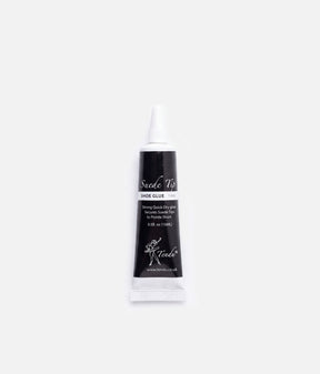 Front of a Tendu Suede Tip Shoe Glue tube with a black label, white screw cap and ballerina logo on a white background.