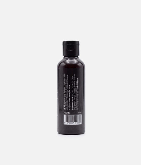 Back of a capped Tendu Spray Rosin bottle showing the 100 ml size, T1110 style code and manufacturer label.