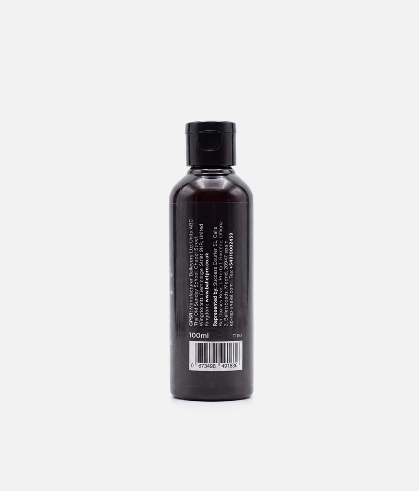 Back of a capped Tendu Spray Rosin bottle showing the 100 ml size, T1110 style code and manufacturer label.