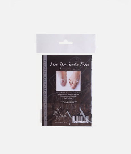 Tendu Hot Spot Sticky Dots packaging with a photograph showing pad placement on the heel and side of the forefoot.
