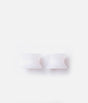 Pair of translucent Tendu Stubby Toe Spreaders showing their short, broad shape and curved sides.