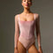 Front of Bodile Valentina Bon Bon pink leotard with rose velvet corset-style panels, sheer blush sleeves and a square neckline.