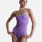 Front view of a dancer wearing YUMIKO Tamara in Iris with Misty Rose camisole straps, a scoop neckline and a high-cut leg.