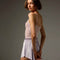 Bodile Zara velvet ballet skirt in pale lilac, shown from the back and side with a curved hem.