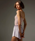 Bodile Zara velvet ballet skirt in pale lilac, shown from the back and side with a curved hem.